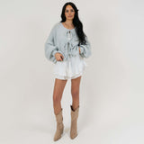 Olívia – Cardigã de Malha Grossa com Laço