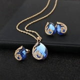 Conjunto de colar e brincos em cristal azul com ouro